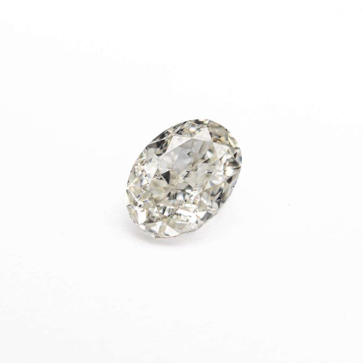 0.70ct Natural Warm K/SI2 Oval Brilliant Diamond