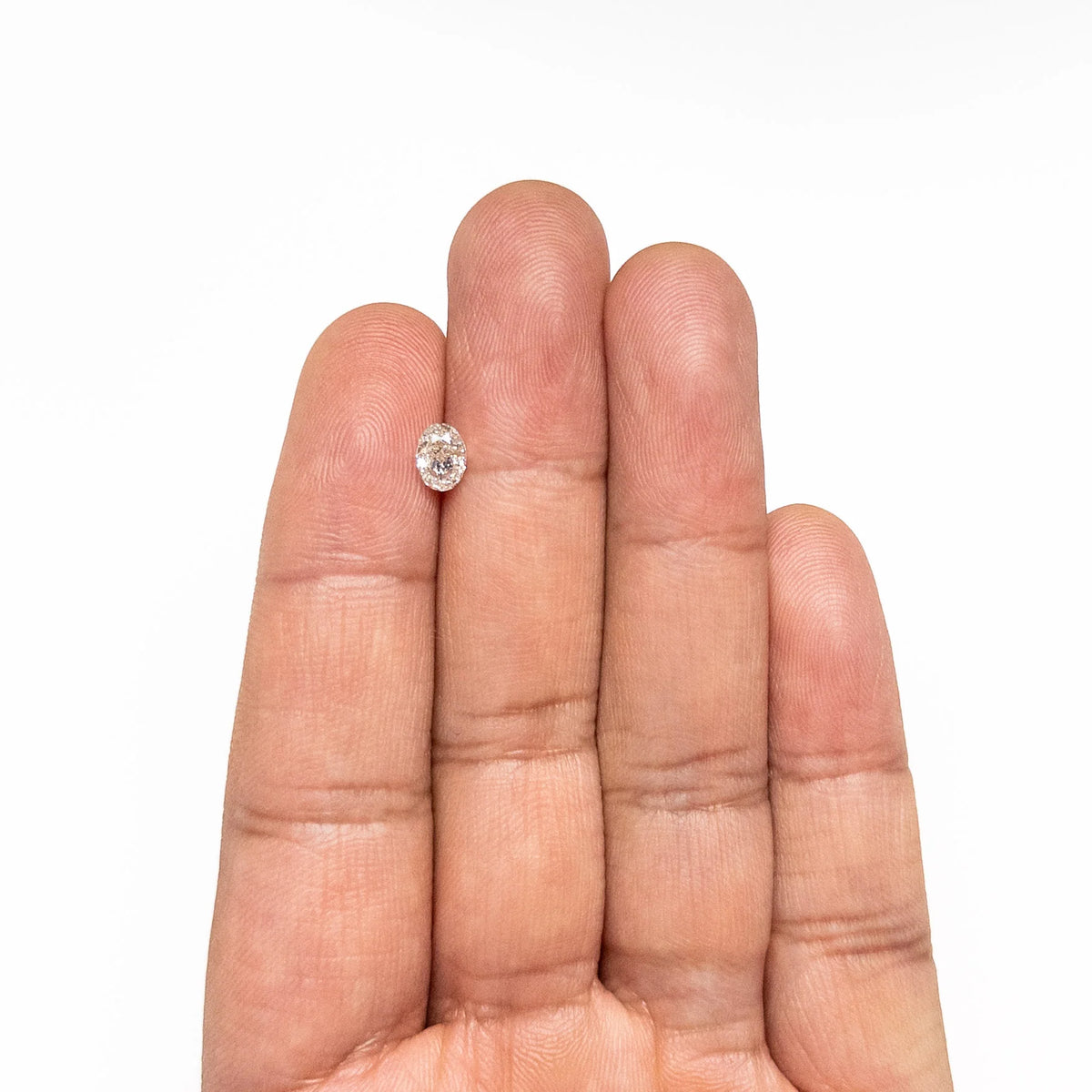 0.70ct Natural Warm K/SI2 Oval Brilliant Diamond